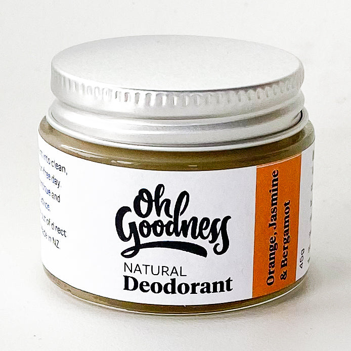 Natural deodorant in Orange, jasmine & bergamot in a glass jar.