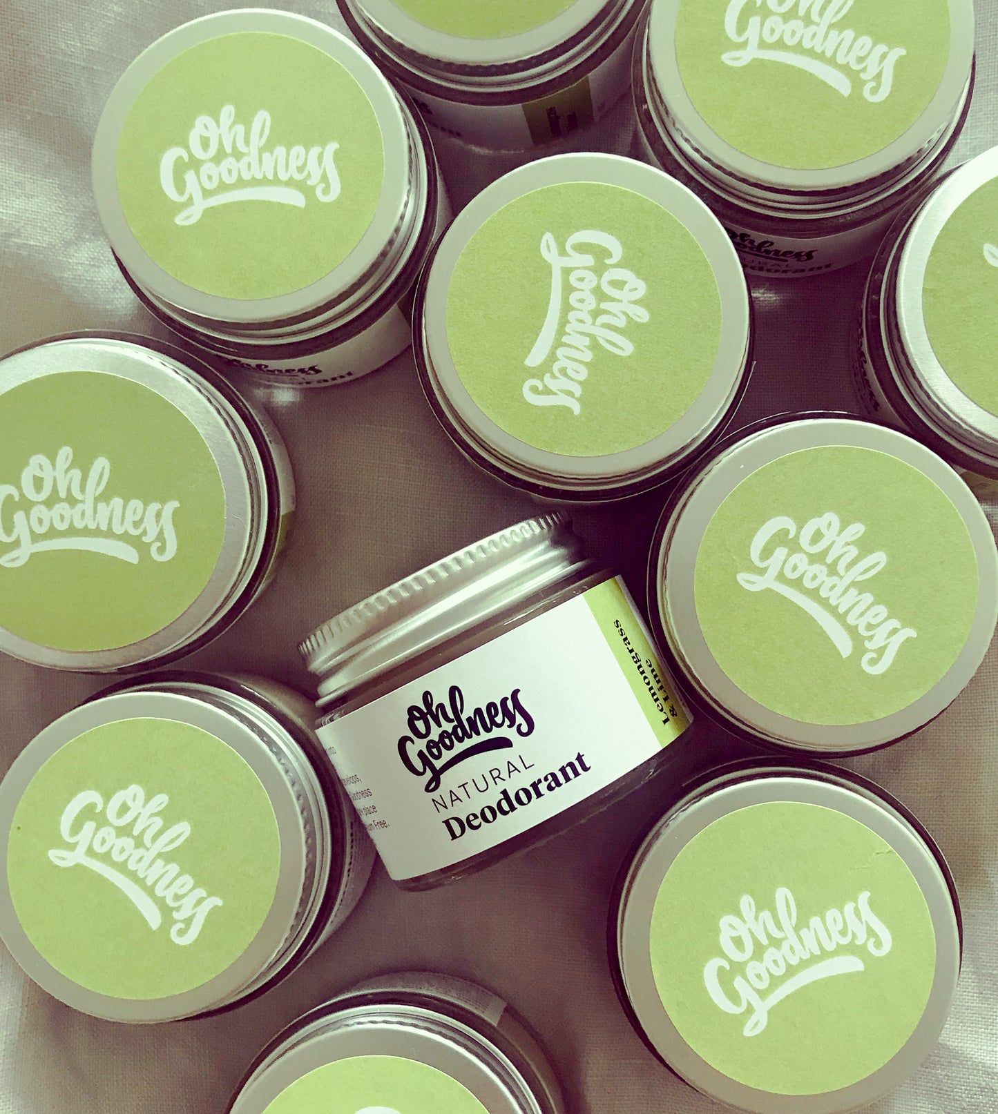 many jars of natural deodorant in lemongrass & lime
